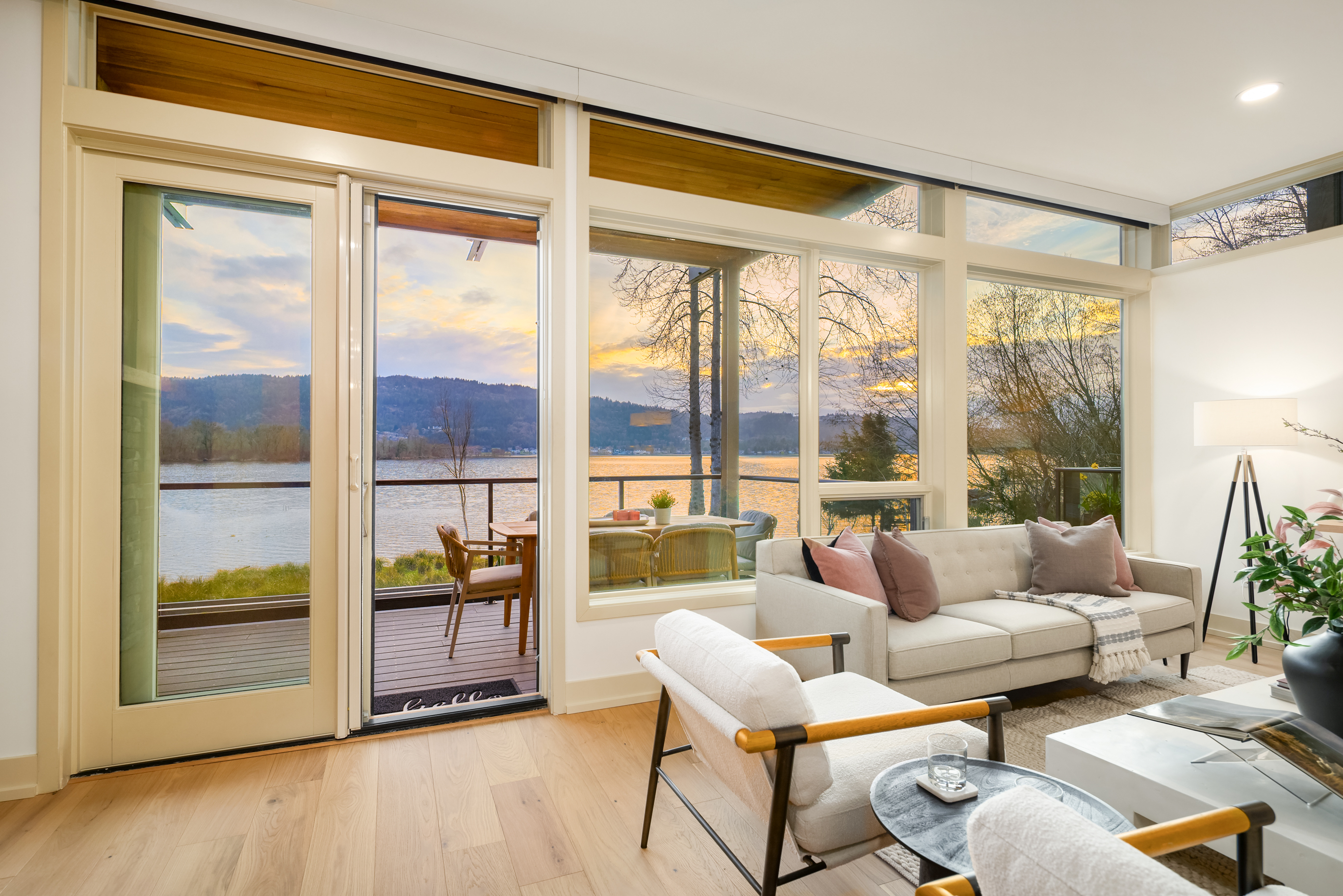 Family room with fireplace and water views