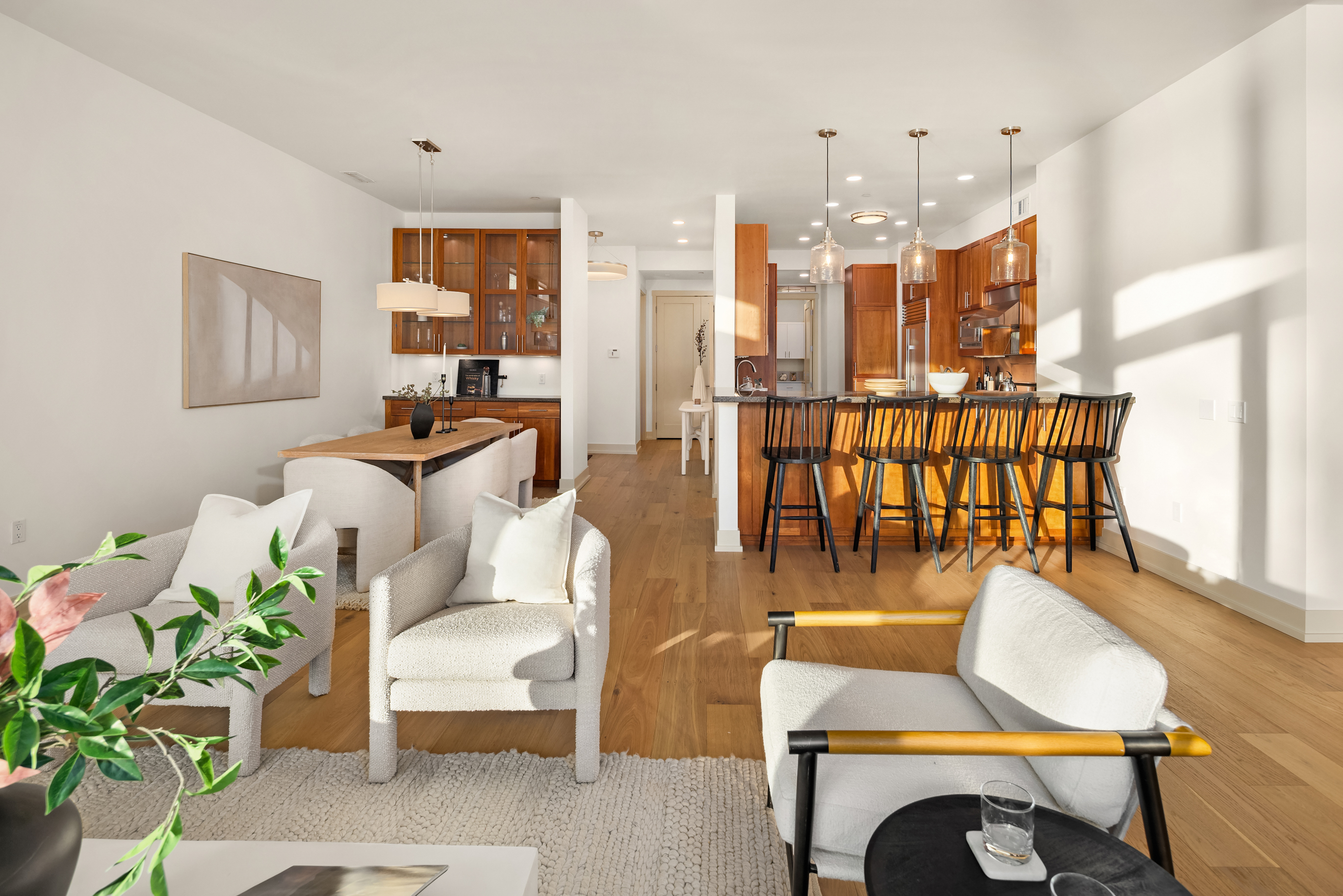 Living room with fireplace and wood built-ins