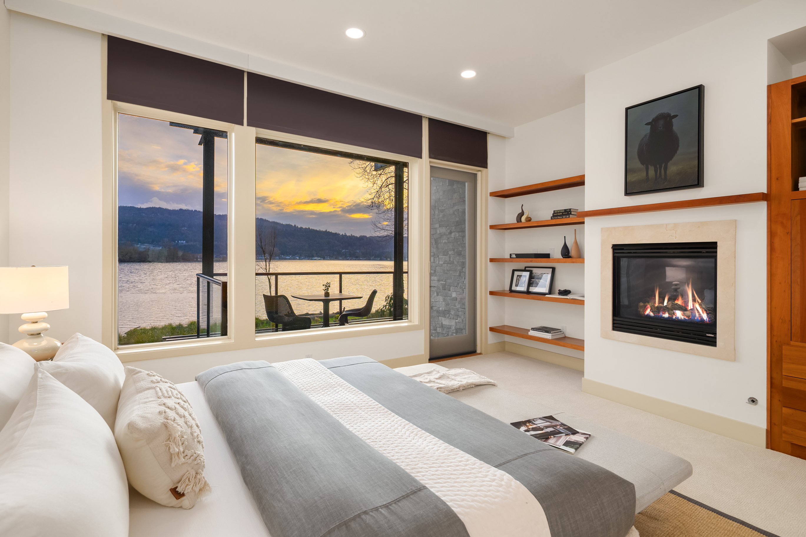 Primary bedroom with sunset view