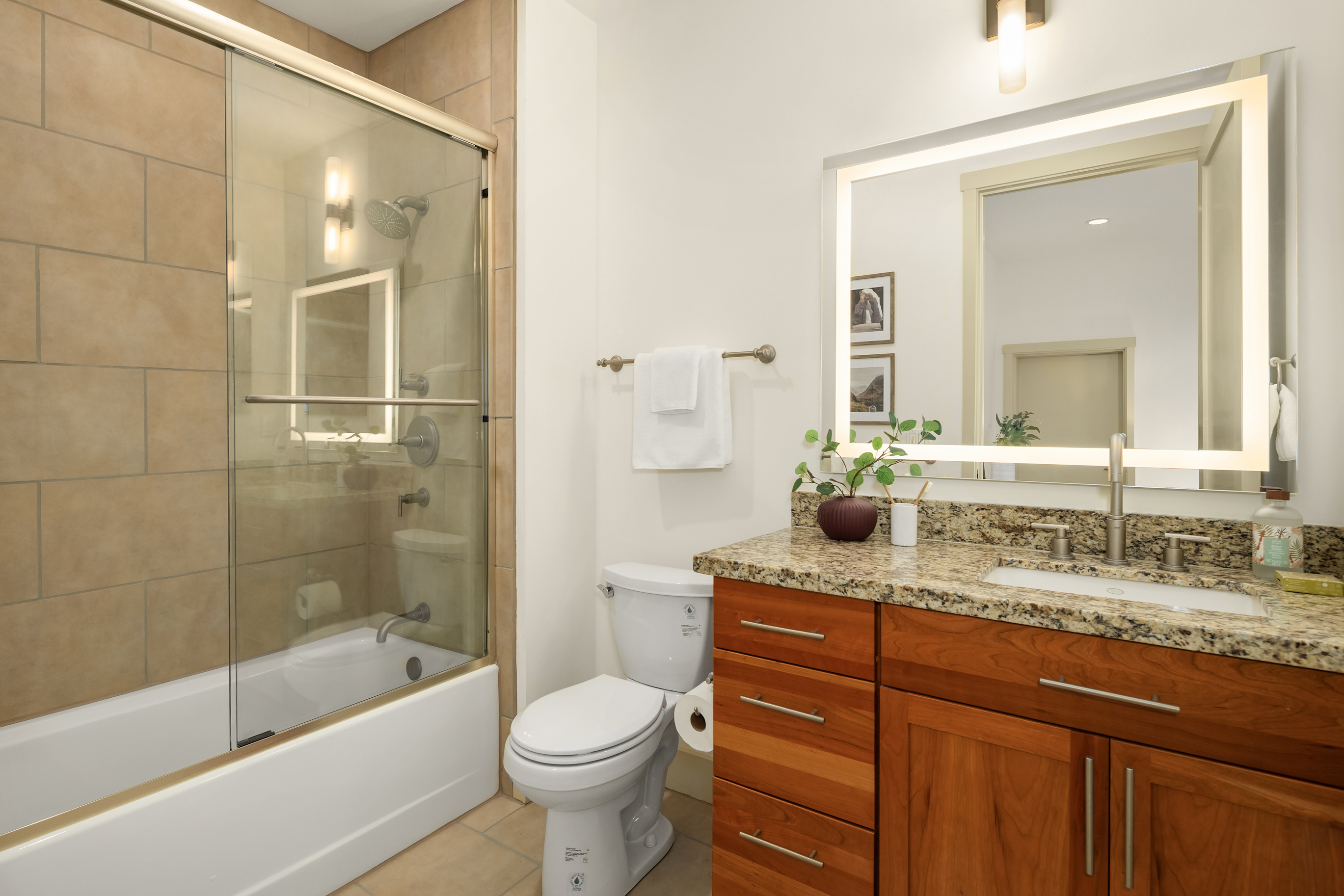 Contemporary exterior with courtyard lighting